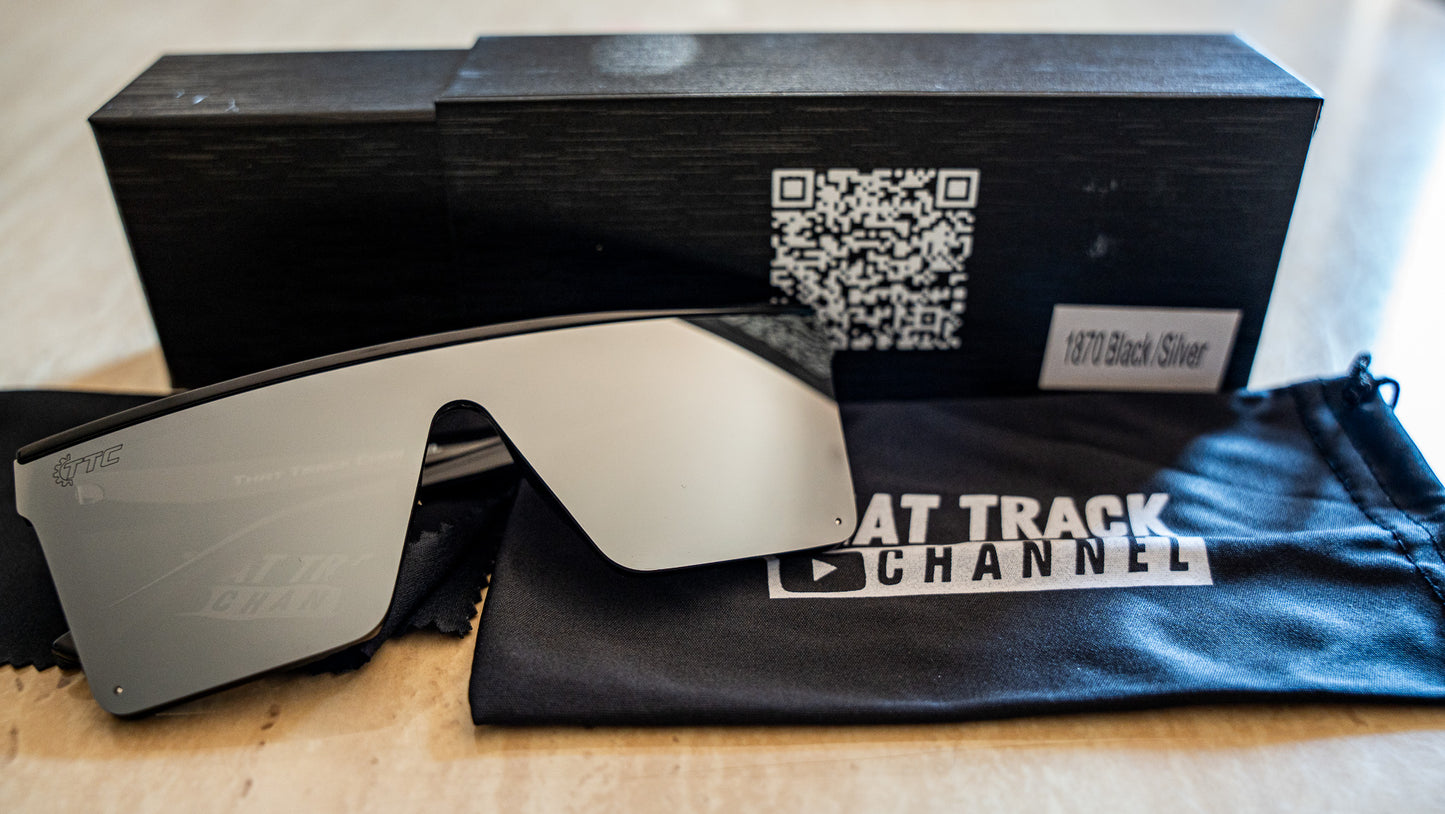 TTC SUNGLASSES BLACK FRAME, SILVER LENS