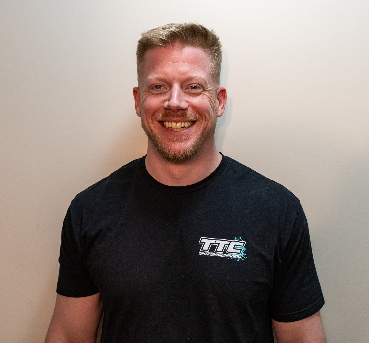 TTC SHIRT - BLACK SHIRT, WHITE FONT, TEAL COLOR SPLASH